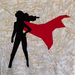 May include: A black silhouette of a person wearing a red cape, standing on a white and gold marble background.