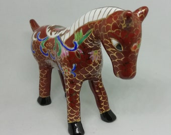 Painted ceramic horse statuette