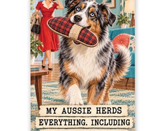 May include: A rectangular metal sign featuring an Australian Shepherd dog holding a red and black plaid slipper in its mouth. The background shows a person in a red dress. The text reads: MY AUSSIE HERDS EVERYTHING. INCLUDING MY LAST NERVE.