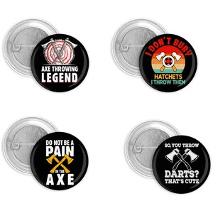 May include: A white ceramic mug with a black handle and the text "But First, Coffee" in a bold, black font. The mug is set against a blurred background, suggesting a cozy setting.