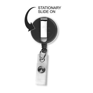 May include: Black retractable badge holder with a clip on the back. The text "STATIONARY SLIDE ON" is printed on the top of the image.