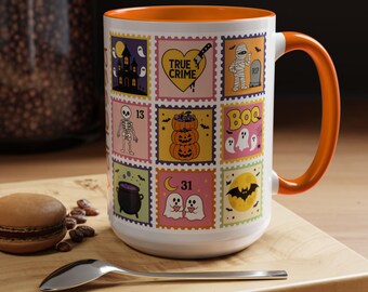 Bright Halloween stamp collage mug with colorful spooky icons, pastel accents, and comfortable C-handle for daily use