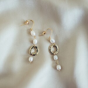 Perfect long gold earrings with natural pearls