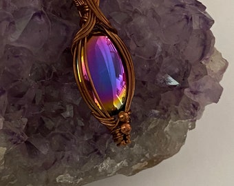 Wire wrapped, copper wire wrapped, rainbow hematite, magic stone, witch, power stone, wire weaving, copper wrapped