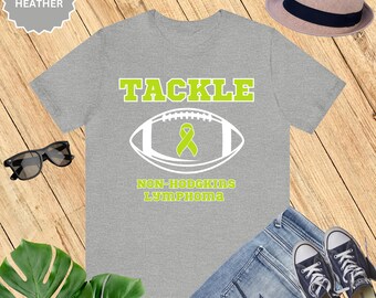 Tackle: Camiseta de manga corta unisex de concientización sobre el linfoma no Hodgkins