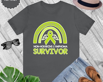 Sobreviviente: Camiseta de manga corta unisex de concientización sobre el linfoma no Hodgkins