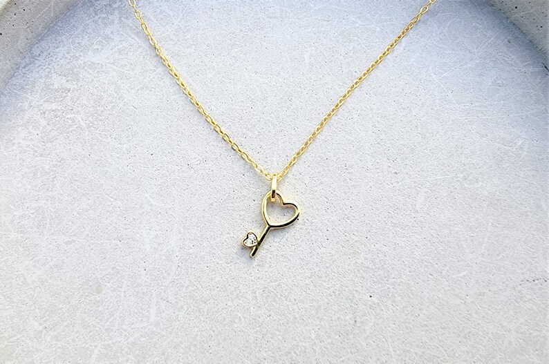 Tiny gold key necklace Clearance