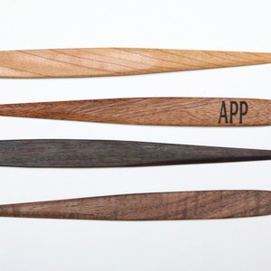 hard wood letter opener made from the highest quality materials, cusomizable with engraved text or logo