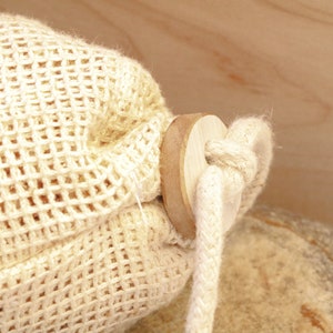 natural cedarwood sachet for moth repellent in closets, basements made from natural cedar wood shavings and organic hemp bag.
