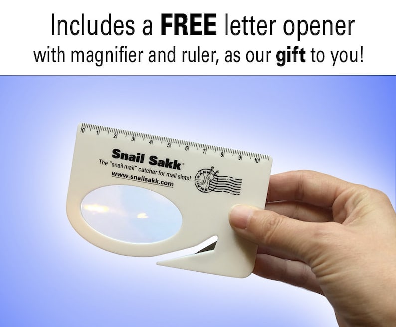 May include: White plastic letter opener with a built-in magnifying glass and ruler. The ruler is marked in inches from 1 to 10. The letter opener has the text "Snail Sakk" and "The "snail mail" catcher for mail slots!" printed on it. The text "www.snailsakk.com" is also printed on the letter opener.