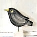 Anita Stone reviewed Blackbird pottery ornament - small bird gift