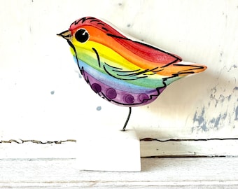 Rainbow bird pottery ornament