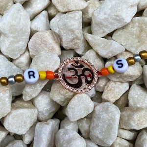 Custom Aum Rakhi with Initials – Handmade Personalised Bracelet – Raksha Bandhan Gift for Brother – Name Rakhi Red Thread - Rose Gold Charm