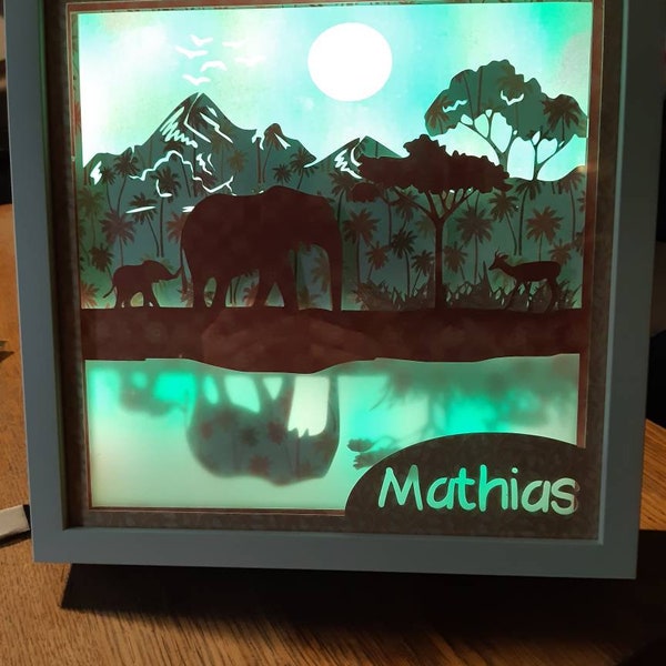 Cadre lumineux Elephant. Découpe papier et guirlande Led. Idée de cadeau.