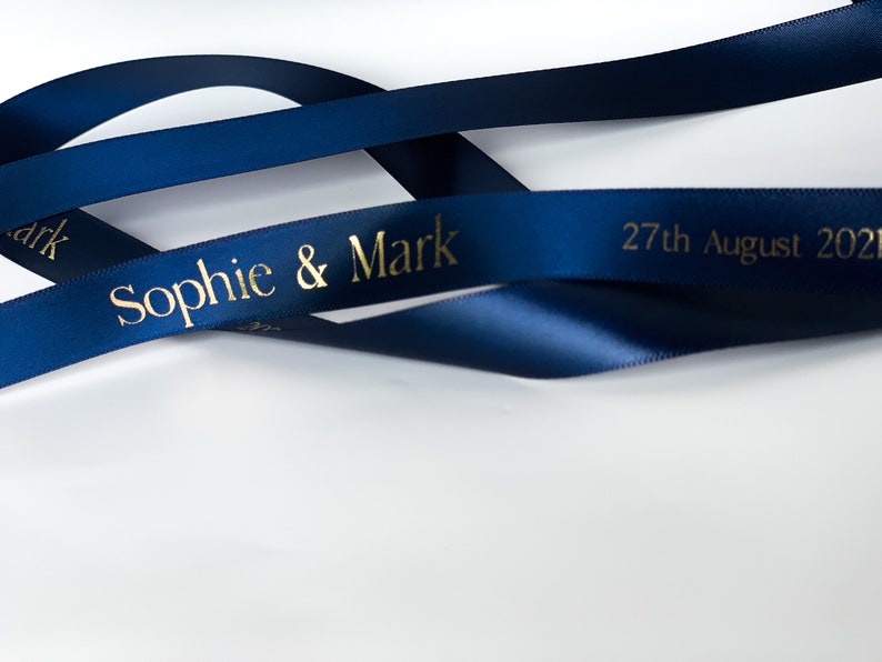 navy blue satin ribbon with gold letters printed