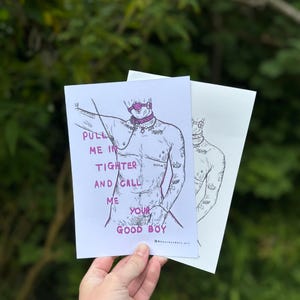 May include: A black and white illustration of a person with a pink collar and leash. The text on the image reads "Pull me in tighter and call me your good boy."