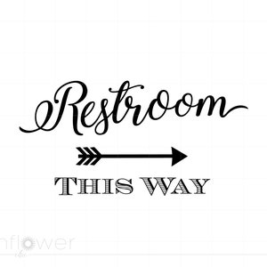 May include: Black and white sign with the text "Restroom This Way" and a black arrow pointing to the right.