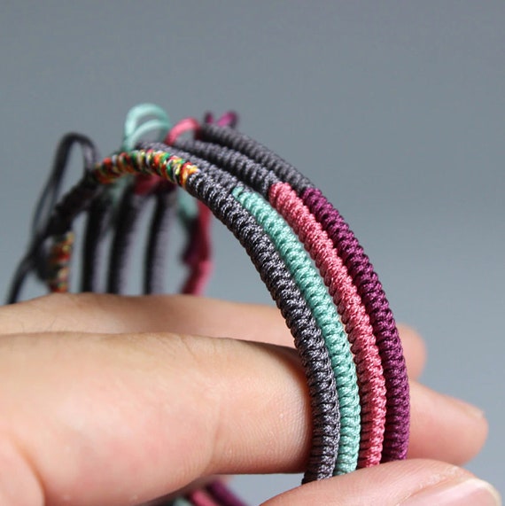 Tibetan buddhist hand hotsell braided lucky knots bracelet