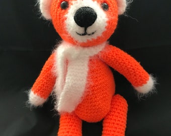 Orange amigurumi bear