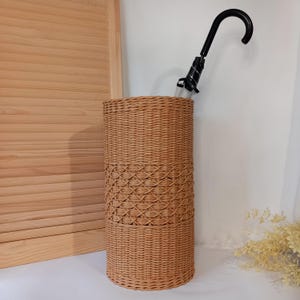 Wicker umbrella holder, umbrella stand, hallway umbrella storage.
