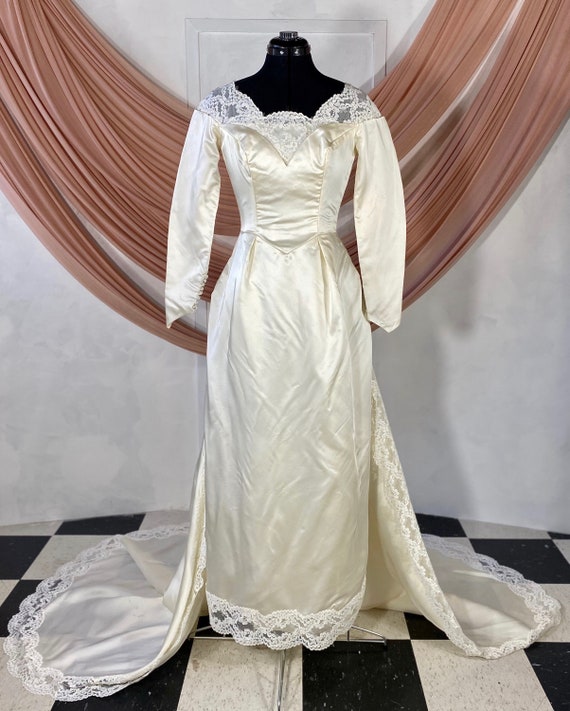 Long Sleeve Wedding Dress with Lace Neckline - image 1