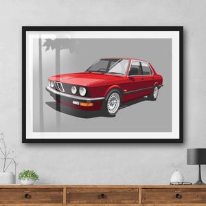 May include: A red vintage BMW 5 Series saloon with a grey background. The car is in good condition and has a classic look.