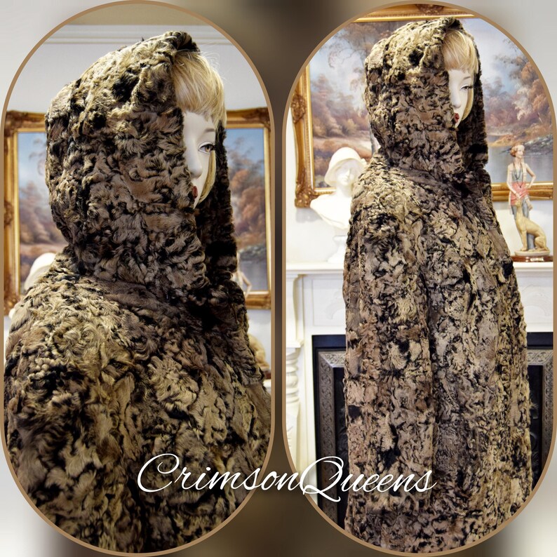 May include: A hooded coat with a textured, patterned design in shades of brown and black. The coat is displayed on a mannequin. The text "Crimson Queens" is visible in the lower portion of the image. The coat appears to be made of a fur-like material.