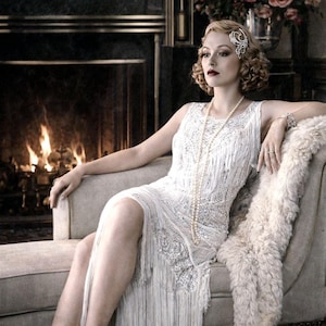 white beaded dress 1920s Gatsby flapper-style wedding gown for my lovely bride in Chesapeake, Virginia @sami_ann_meland, Fully with glittering metallic silver, rose gold and fringes layering the skirt. The To finish the design Beaded 1920s Style White Dress