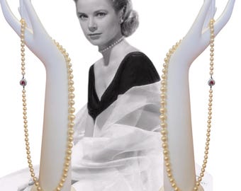 Vintage 1920's vanilla simulated single strand pearl necklace with sterling silver clasp with ruby and zircons