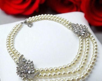 Vintage Art Deco 1920's simulated double strand pearl  with two rhinestone ornate silver elements
