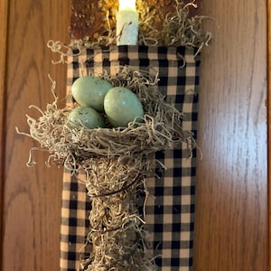 Bird nest wall pocket