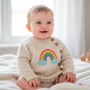 Regnbågskofta för barn i PDF-format, storlekar nyfödd till 4 år, nybörjarvänlig, enkel uppifrånstickad raglan-asymmetrisk barntröja