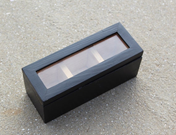 wooden box with glass lid