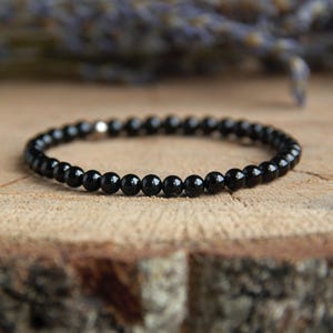 Svart turmalinarmband: Minimalistiska stapelbara smycken i rostfritt stål