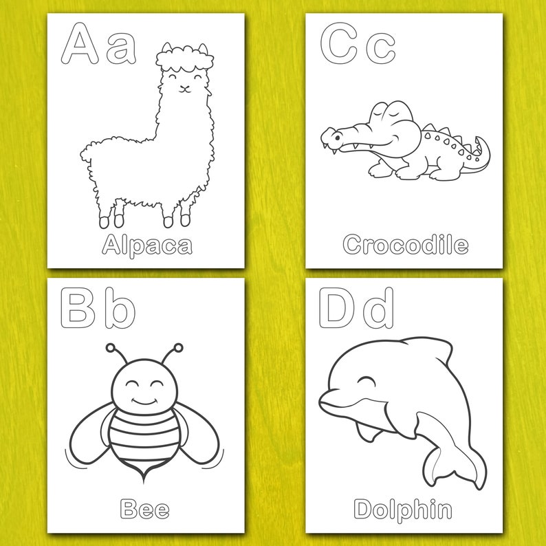 May include: Four white flashcards with black line drawings of an alpaca, crocodile, bee, and dolphin. Each card has a capital letter and the animal's name: Alpaca, Crocodile, Bee, and Dolphin. The background is a light yellow-green.