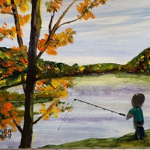 Pebble art fisherman