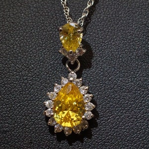 Bella Luce Simulated Diamond Pendant Sterling Silver Necklace (C4869ES)