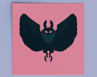 May include: A square art print featuring a dark navy blue moth with large, spread wings and prominent antennae. The moth has glowing pink eyes and a textured body, centered against a solid, flat, light pink background square.