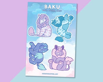 May include: A Baku vinyl sticker sheet featuring four cartoon creature illustrations in shades of blue, purple, and pink. The text BAKU VINYL STICKER SHEET and CURIOUSNATURE.ART are printed on the light blue background with white clouds.
