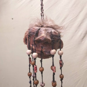 Beaded shrunken head