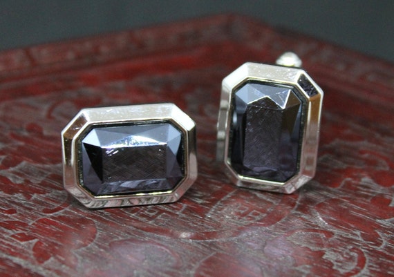 An  elegant pair of vintage cuff links. The gloss… - image 1