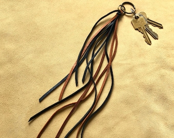 Tassel tas, multi kwastje, tasfranje, accessoire kwastje, kwastje meerkleurig, leren sleutelhanger, kwastje bruin leer, kwastje franje, sleutelhanger franje, gips