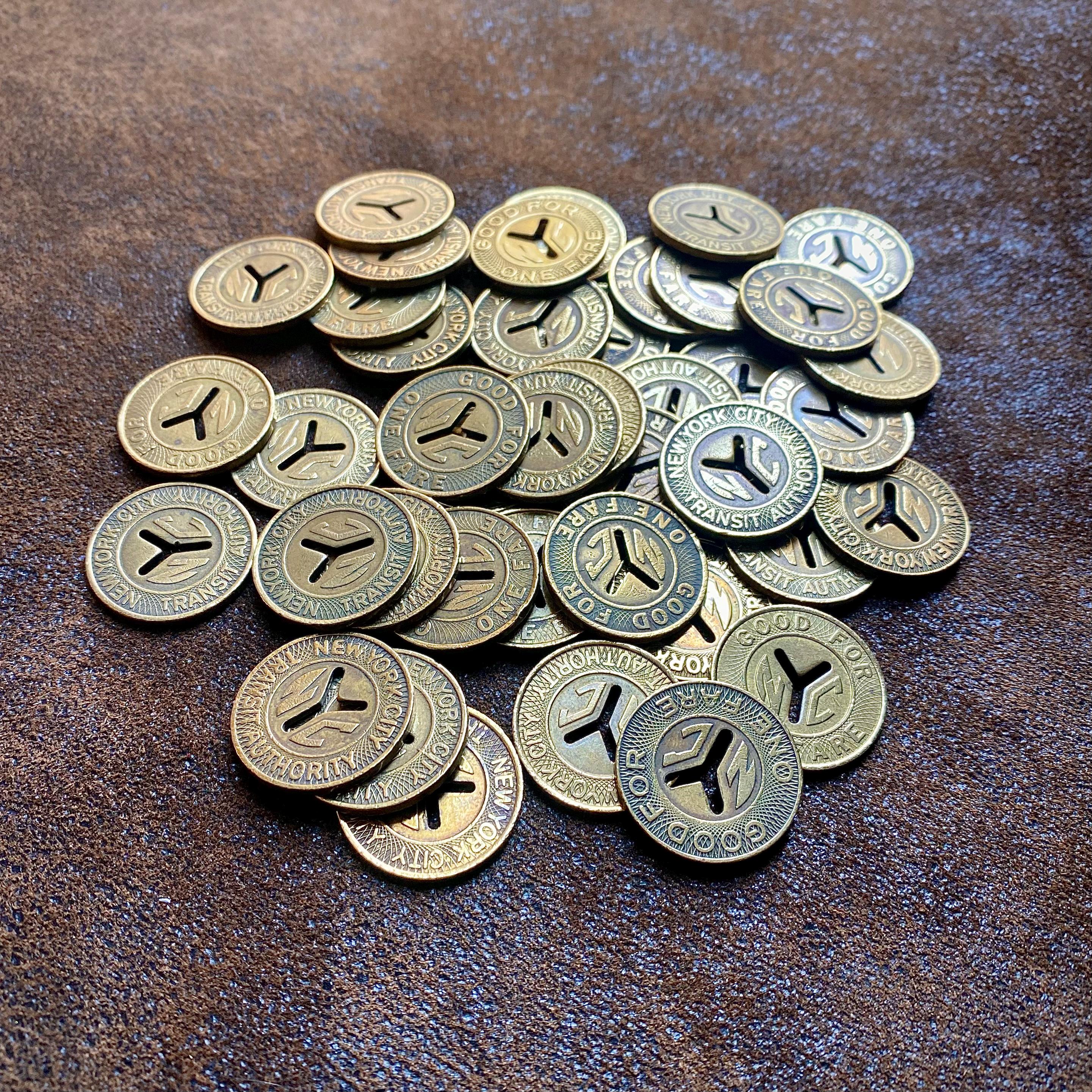 One (1) New York Subway Token, Large Y Cut-out, Quarter Size or