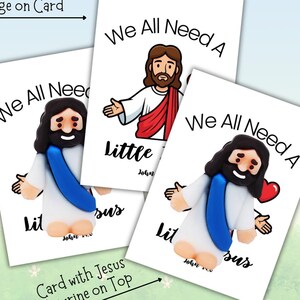 May include: Three greeting cards with a cartoon Jesus figurine on top. Each card has the text "We All Need A Little" and a different Jesus figurine design. One figurine has a red heart.