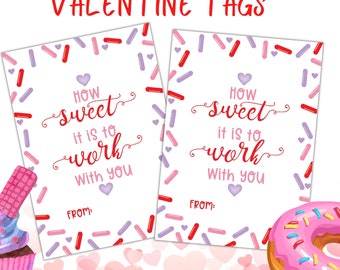 May include: Two printable Valentine's Day tags with a pink and white sprinkle background. The text on the tags reads "How sweet it is to work with you."  The tags are decorated with pink hearts and red and purple sprinkles.  The text "From:" is at the bottom of each tag.