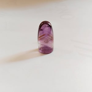 Amethyst bullet shape cabochon attractive piece hand polished nice piece size 22x12m.m.