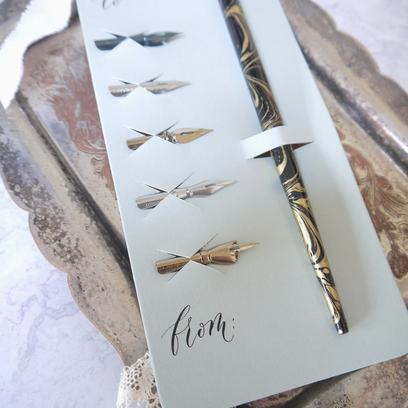 close up of calligraphy nibs and pen set