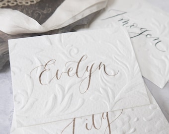 Embossed Wedding Name Cards, Custom Calligraphy Place Cards, Elegant Handwritten Floral Table Decor, Off White Textured Place Names