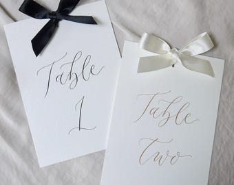 Handwritten Calligraphy Wedding Table Number Signs – A6 with Bow