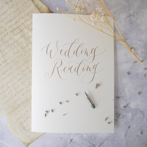 Wedding reading paper cover with personalised calligraphy lettering on the front